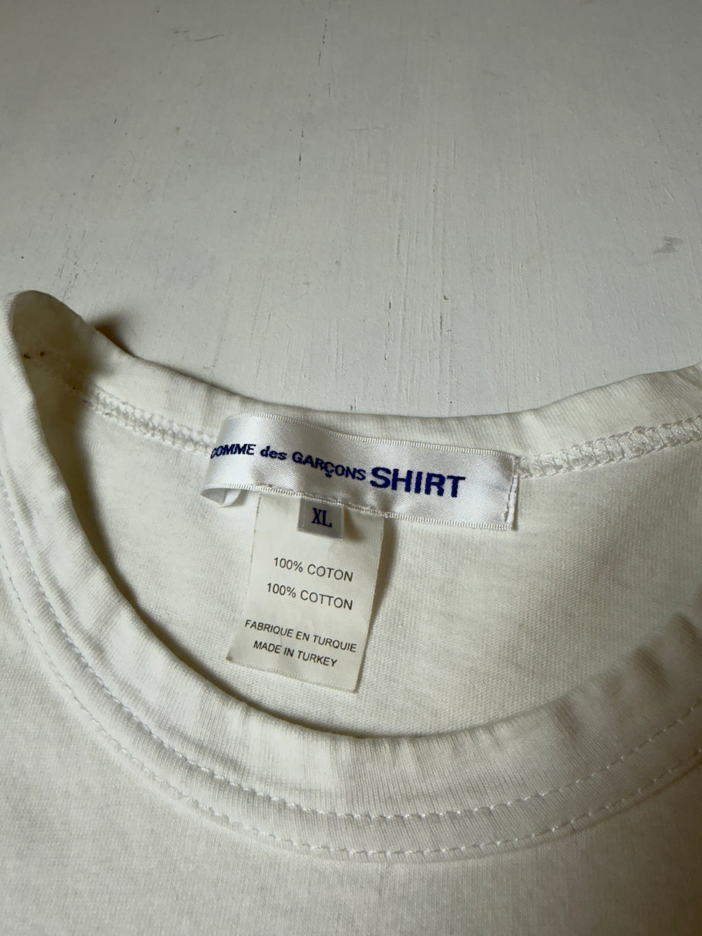 White CDG Comme Des Garcons Kaws tee
